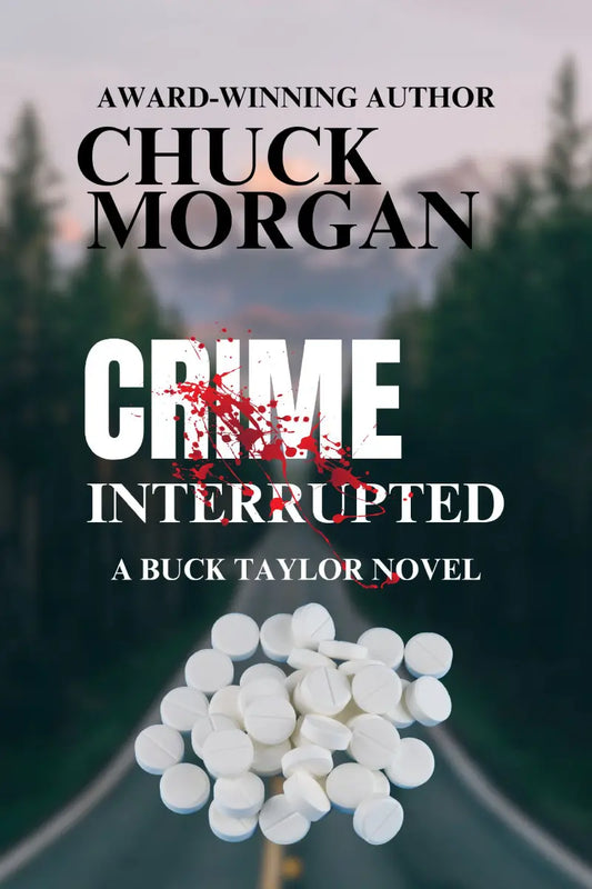 Book cover for 'Crime Interrupted' by Chuck Morgan, featuring a blurred forest road background, large white title text with red splatter, and a pile of white pills in the foreground.